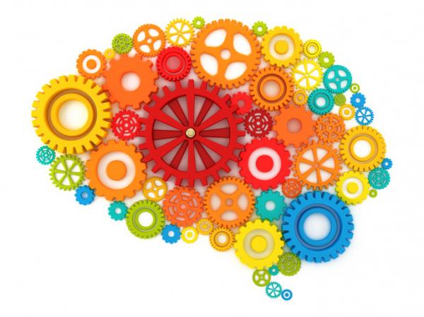 Colorful gears forming a human brain together with one red big central cog. 3D rendering isolated on white. 